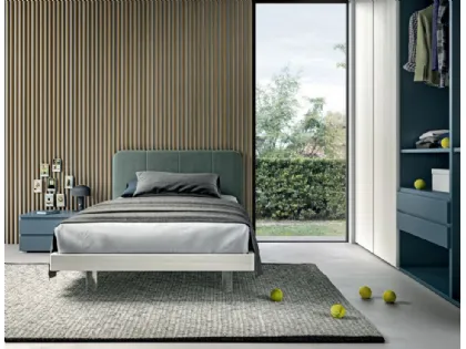 Refined and modern bedroom, complete with wardrobe and study area.