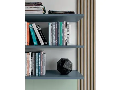 Refined and modern bedroom, complete with wardrobe and study area.