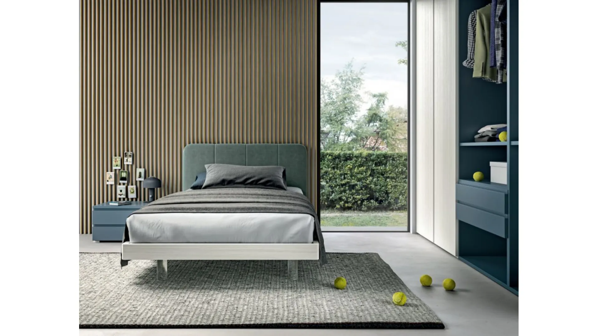Refined and modern bedroom, complete with wardrobe and study area.