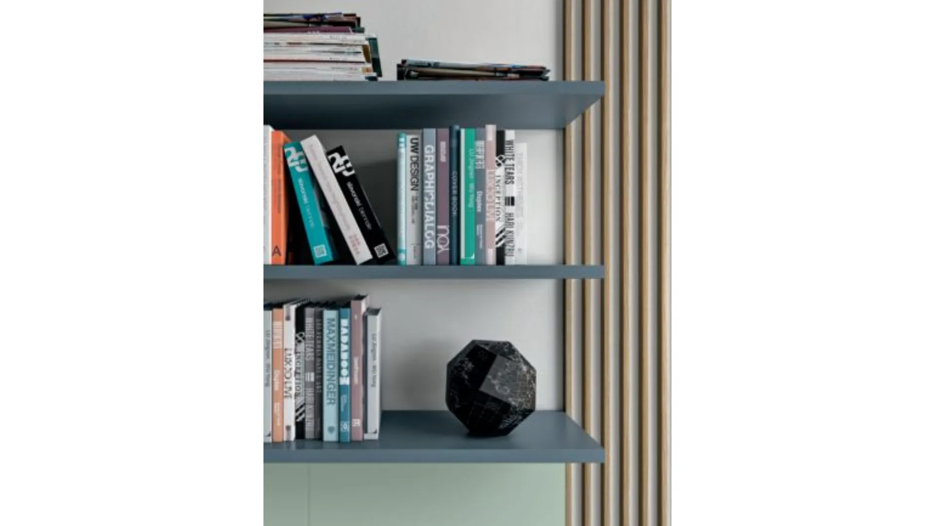 Refined and modern bedroom, complete with wardrobe and study area.