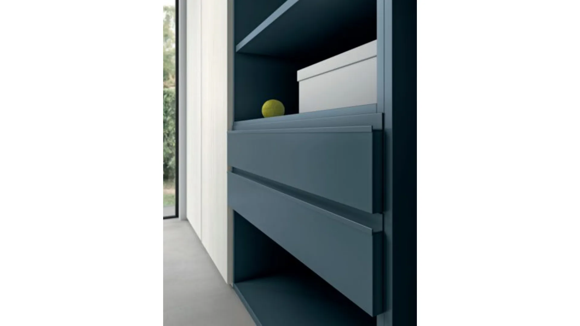 Refined and modern bedroom, complete with wardrobe and study area.