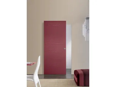 Sliding wooden door flush with the wall