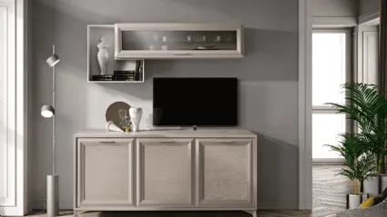 Modern complete living room with sideboard, open compartments and suspended glass wall unit.