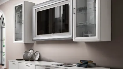 Mobile living room with round shapes, featuring a double suspended glass cabinet and a suspended TV frame.