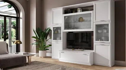 Modern living room complete with wall units, open compartments, and a large surface for support.
