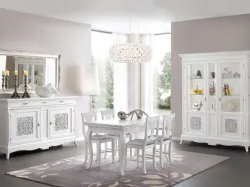 Classic living room complete with sideboard, table with 4 chairs, silverware all made of high-quality materials