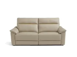 Fabric sofa with low feet and option of relaxation movement.