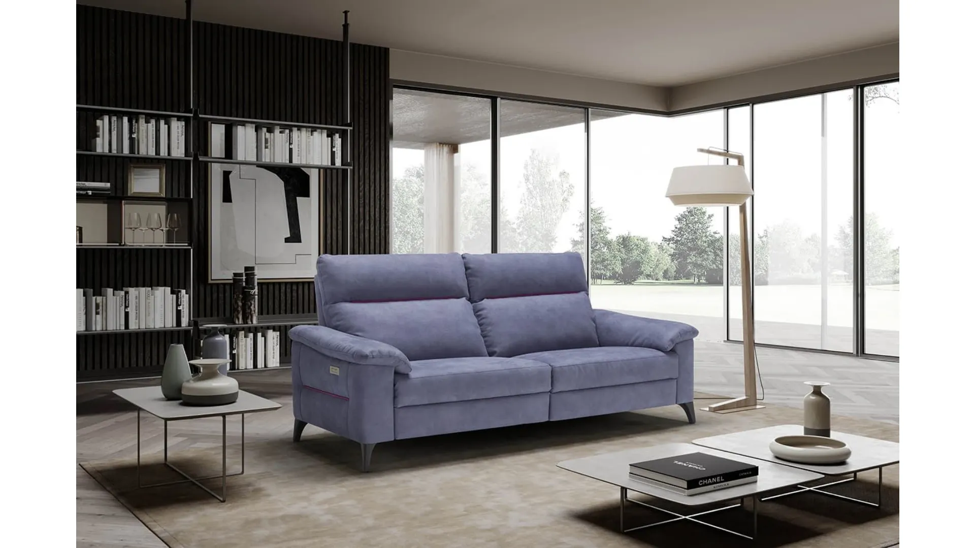 Designer fabric sofa with wooden frame and metal legs.