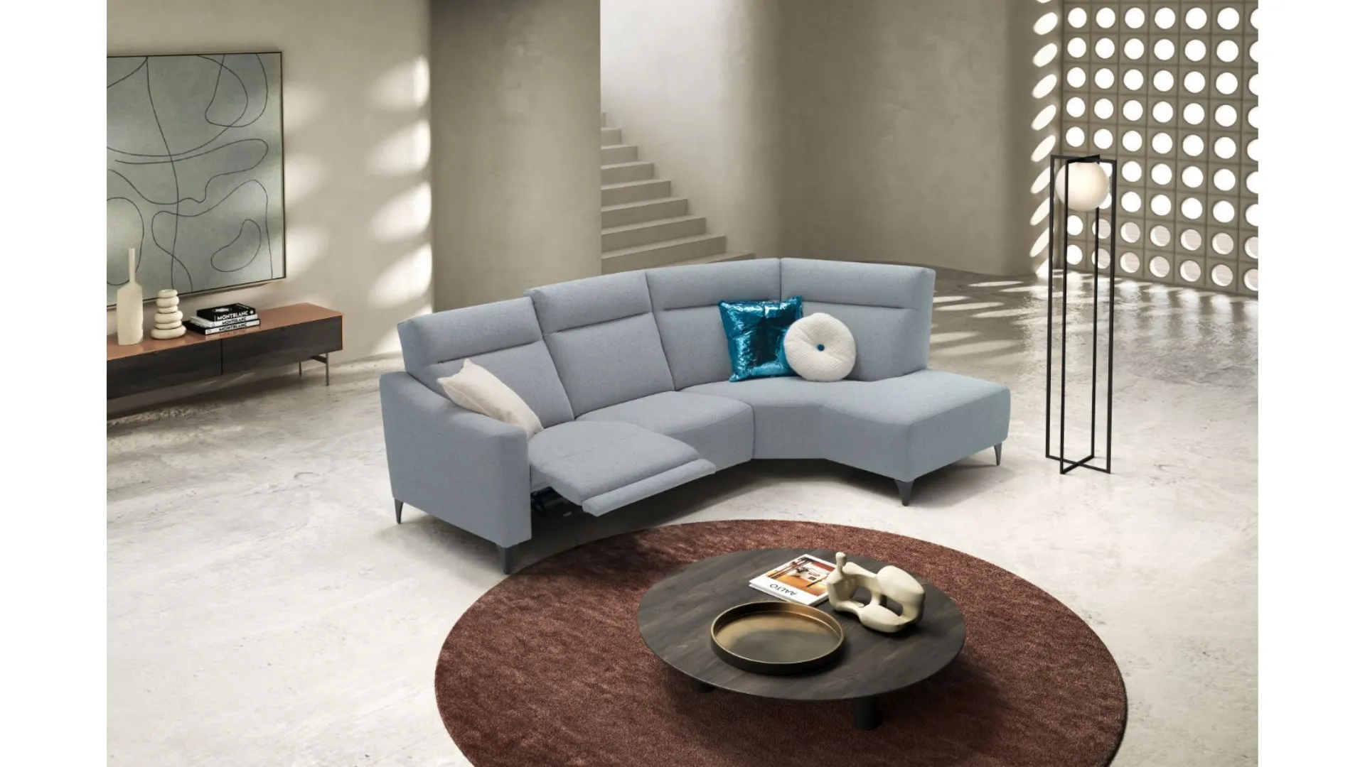 Fabric sofa with elegant and refined lumbar support.