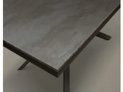 Extendable table of various sizes with side extension and central base.