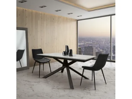 Extendable table with metal base and 50cm lateral extension.