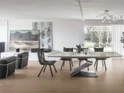 Table with central design base and marble-effect porcelain top.