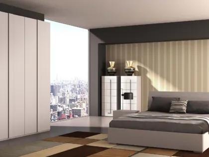 Modern double room with Bologna bed and matching elements in Larice Bianco finish.