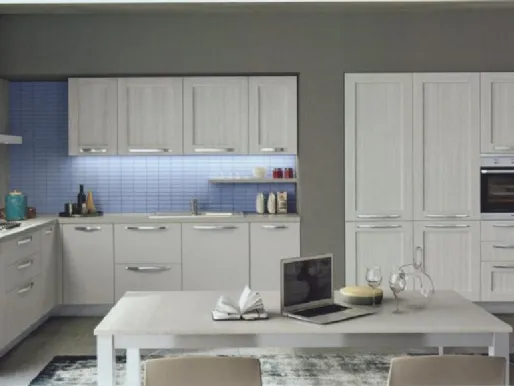 Modern corner kitchen with built-in appliance columns