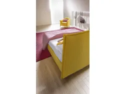 Silene bed with linear headboard softened by light lateral folds