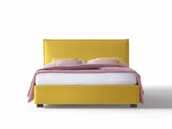 Silene bed with linear headboard softened by light lateral folds