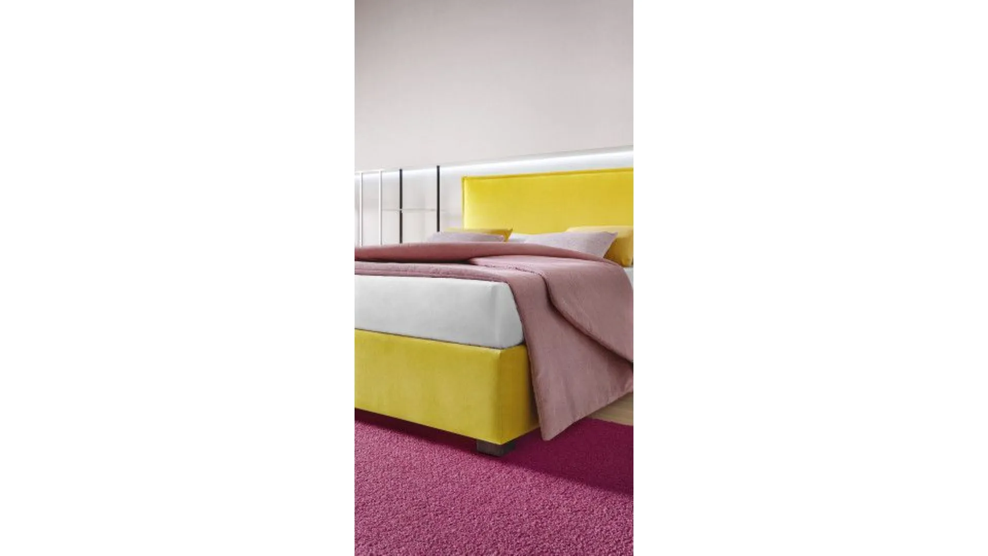 Silene bed with linear headboard softened by light lateral folds