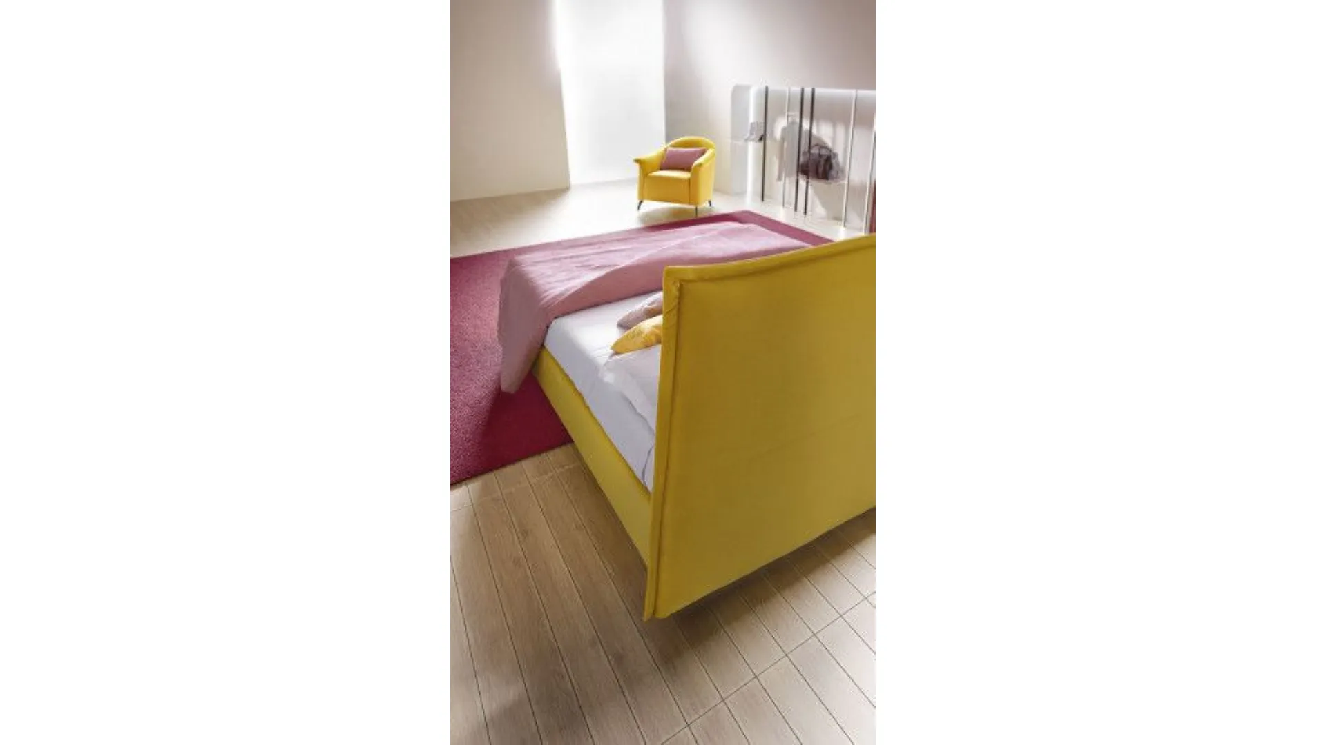 Silene bed with linear headboard softened by light lateral folds