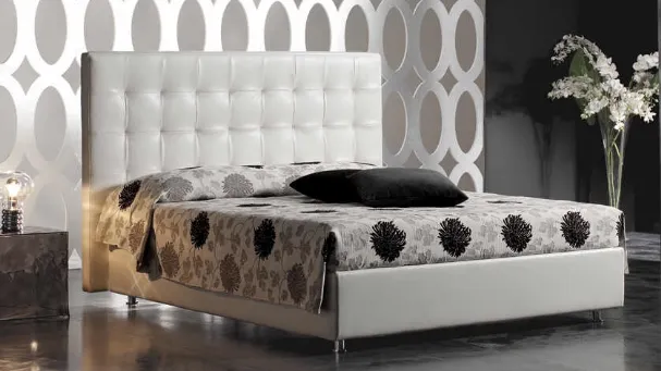 Modern bed with leather headboard